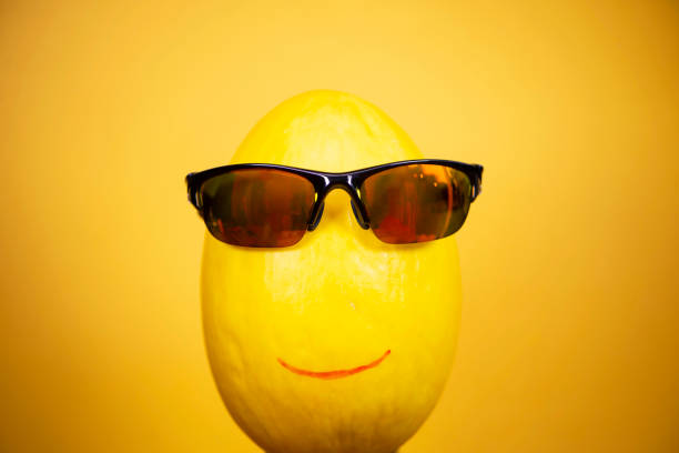 istock funny happy face melon in sunglasses 1457053998