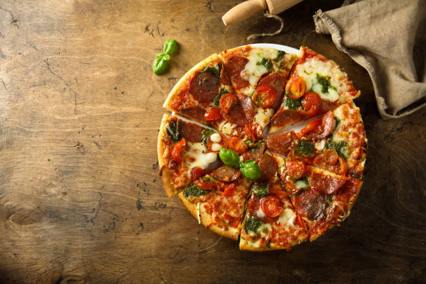 istock Pizza with sausage and pesto 1457054517