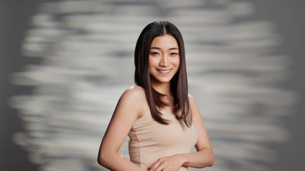 istock Asian woman expressing tenderness and confidence 1457055359