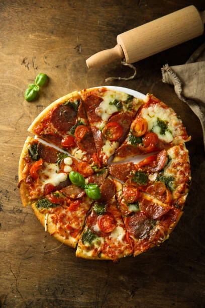 istock Pizza with sausage and pesto 1457055425