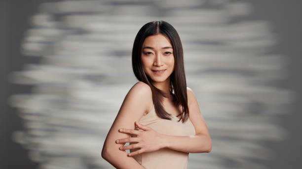 istock Glamorous happy lady posing with glowing look 1457055946
