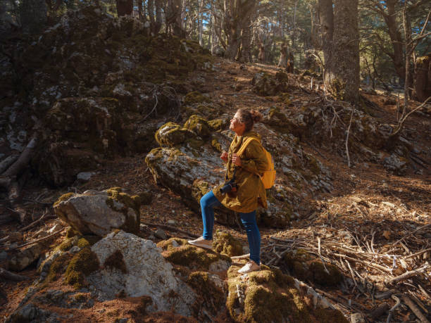 istock caucasian woman enjoys being in nature, 1457057657