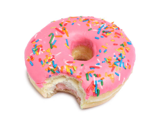 istock Sweet bitten glazed donut decorated with sprinkles isolated on white 1457058045