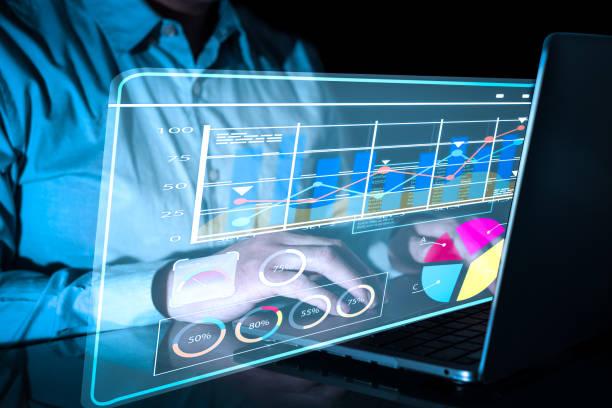 istock businessman use virtual laptop work pie charts for investment analysis 1457062112