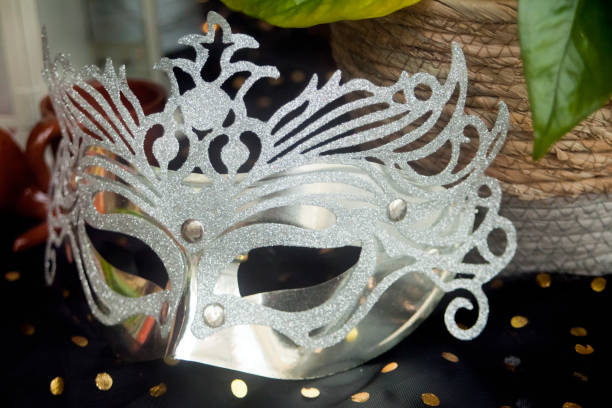 Carnival celebrations, mask decorating store window. Galicia, Spain.
