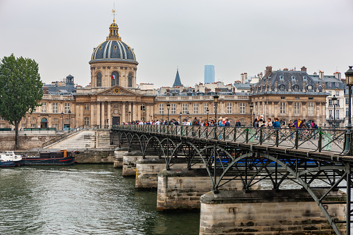 Paris, France - July 30, 2011 : Pont Des Arts over River Seine towards Institut de France.
