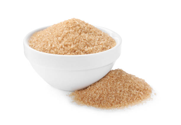 istock Brown sugar and bowl on white background 1457070658