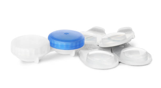 istock Packages with contact lenses and case on white background 1457070810