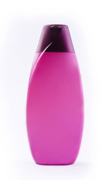 istock Pink Shampoo Bottle isolated on white background 1457076358