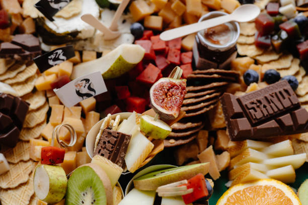 istock colored cheese and fruit on the table. nice and tasty aperitif on the table 1457077593