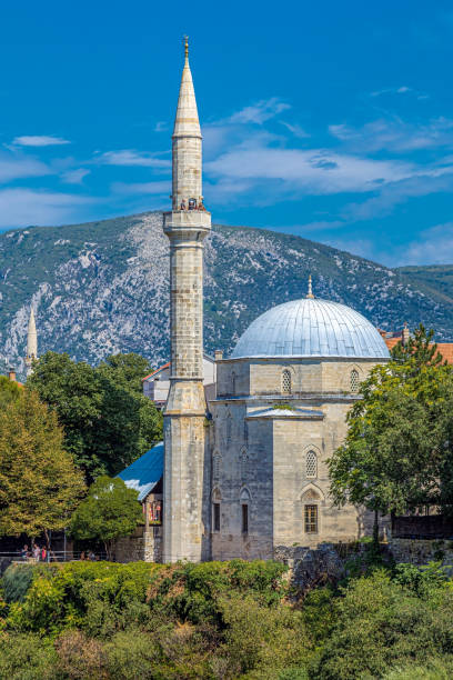 Mosque Koski Mehmed Pasha, Mostar, Bosnia and Herzegovina, Europe Mostar: Mosque Koski Mehmed Pasha built in 1617-1619 on the orders of the viceroy Koski Mehmed Pasha.The height is 28 meters with 78 steps, encircling the minaret mostar stock pictures, royalty-free photos & images