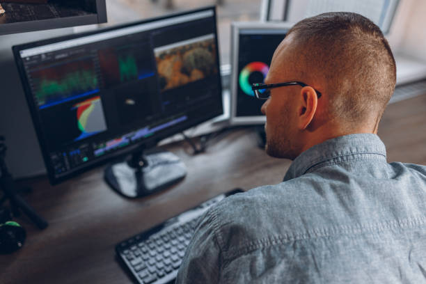 istock Film editor working on desktop PC in home office 1457079961