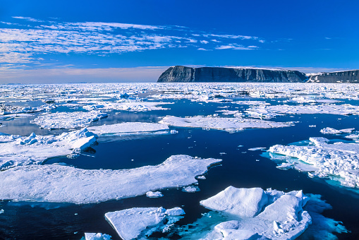 Panoramic view of ice pack with mountains on the background Svalbard Islnads