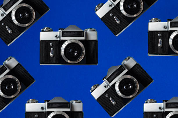 istock Vintage Retro Camera on a Colored Background. Photo Camera Creative Concept Background. Travel, Vacation and Photography Concept 1457081114