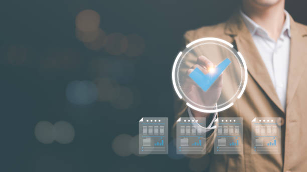 istock Businessman Audit documents, quality assessment management With a checklist, business document evaluation process, market data report analysis and consulting, review process correctness of document 1457089114