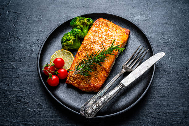 istock Grilled salmon fillet with vegetables 1457092047