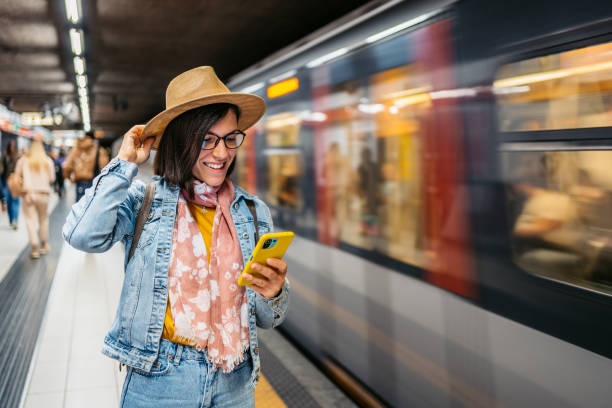 istock Young Woman Using Phone In A Subway Station 1457094758