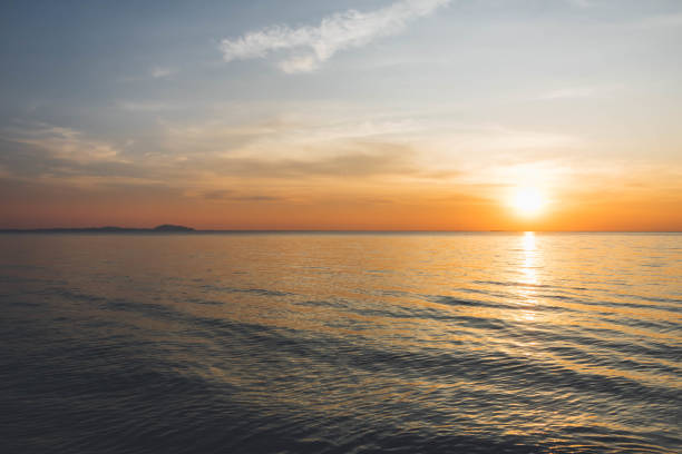 istock Natural Sunset Sunrise over the ocean. Beach vibe. 1457095922