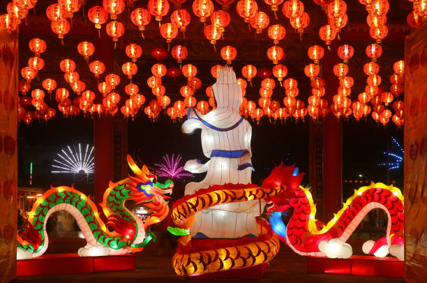 istock Large Chinese Goddess and Dragon Shaped Lanterns with the Hanging Lanterns in Rows Displayed at the Courtyard of Chinese Buddhist Temple During Lunar New Year 1457096779