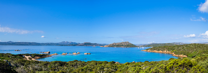 Granite rocks and turquoise colored waters in the south of Caprera in the Maddalena Archipelago, Sardinia (3 shots stitched)