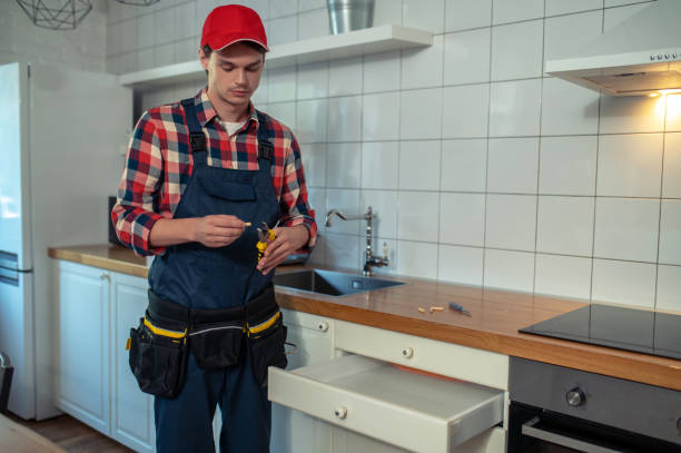 istock Serious repair technician fixing a cabinet drawer 1457104274