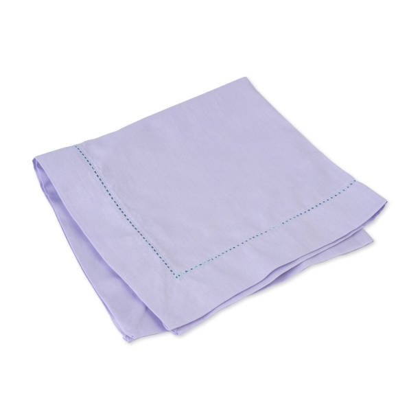 istock Folded purple tissue napkin isolated over white background 1457105650