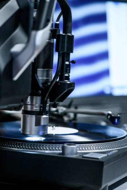 istock Vinyl Record Printing Pressing Plant, Quality control with microscope 1457105995