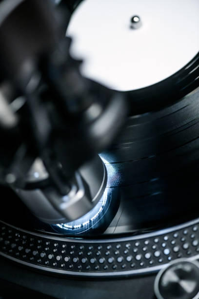istock Vinyl Record Printing Pressing Plant, Quality control with microscope 1457106128