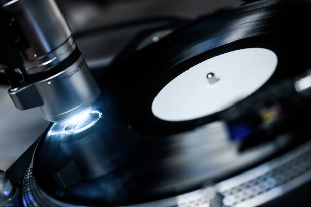 istock Vinyl Record Printing Pressing Plant, Quality control with microscope 1457106325