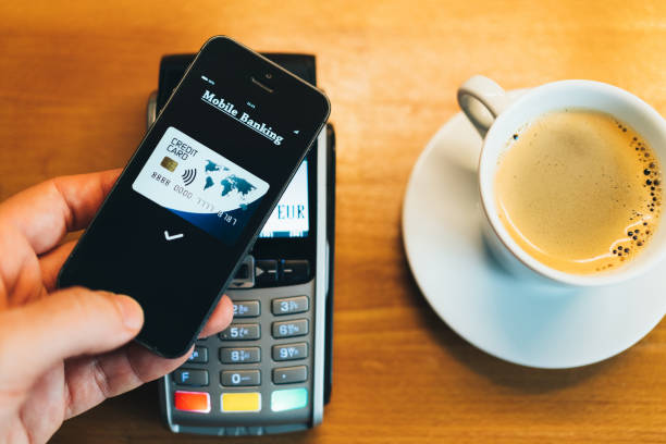 istock Contactless payment in the coffee shop 1457114355