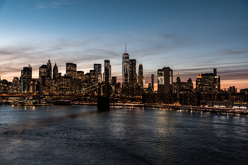 Brooklyn Bridge and the New York Financial District at dusk