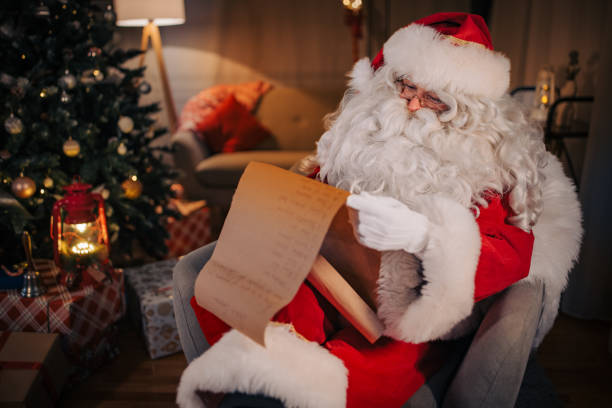istock Santa Claus reading wishes 1457116036