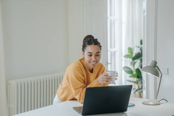 istock Young woman working at home 1457116320