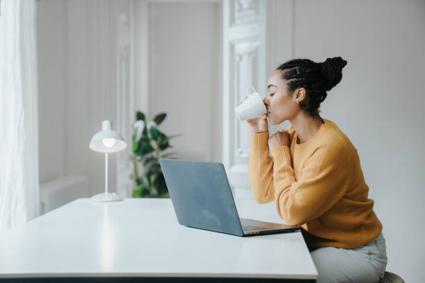 istock Young woman working at home 1457116366