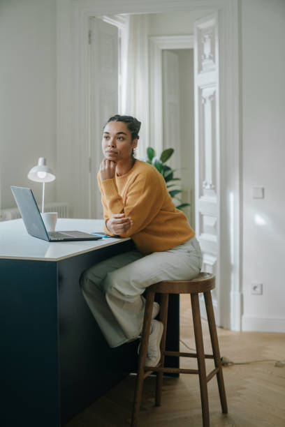 istock Young woman working at home 1457116415
