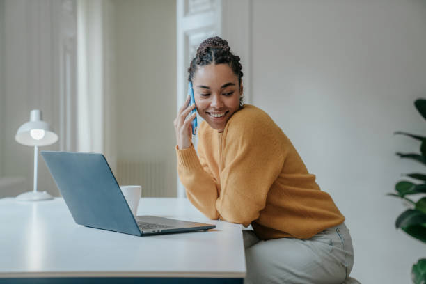 istock Young woman working at home 1457116462