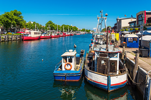 Fishing boats in spring time in Warnemuende, Germany.