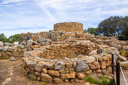 The Nuraghe La Prisgiona is a large Nuragic archaeological site dating back to the 2nd millennium BC, and consisting in a nuraghe and a village of around 90-100 buildings. It is located near Arzachena in Gallura, in the northeast of Sardinia.