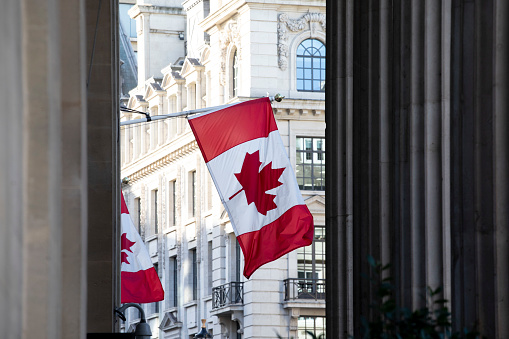 Canadian flags outside Canada House on Trafalgar Square in central London