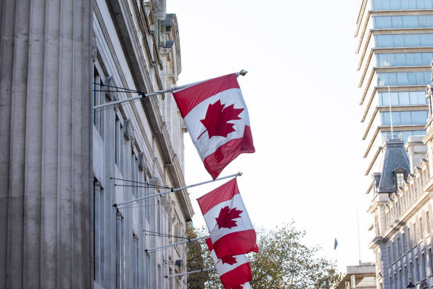 istock Canada flags hanging outside a building in London 1457121703