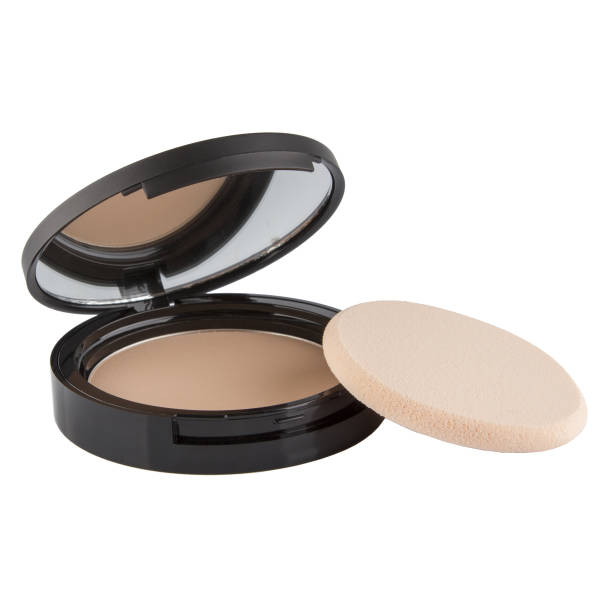 istock Face cosmetic compact makeup powder in black round plastic case with mirror and sponge isolated on white background 1457123670