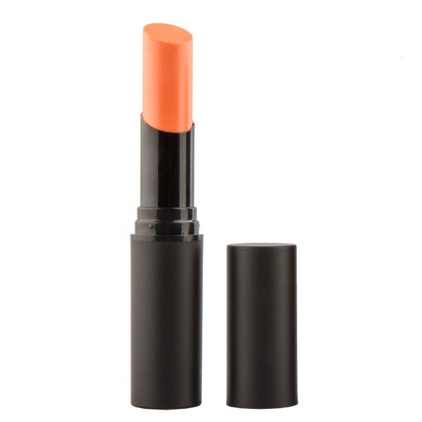 istock Open coral color lipstick in a black case on a white background 1457124738