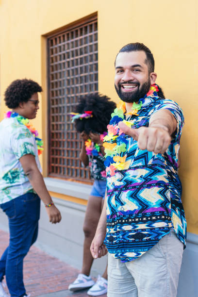 istock Man enjoying carnival in the streets 1457126018