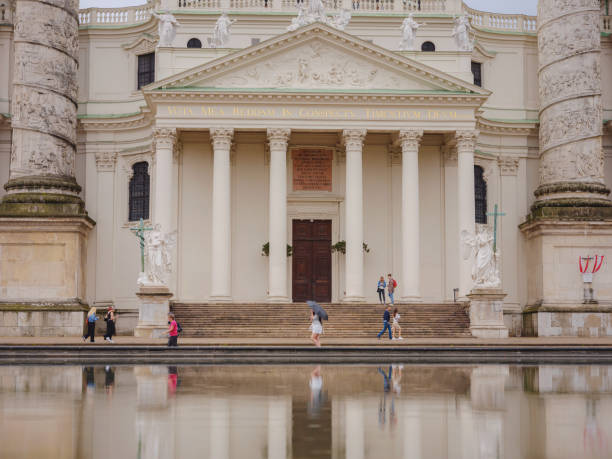 Vienna, Austria - August 8, 2022: Catholic church located in southern part of Karlsplatz, Vienna. One of symbols of city. The Karlskirche is prime example of original Austrian Baroque style.