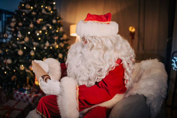 istock Santa Claus reading wishes 1457133981
