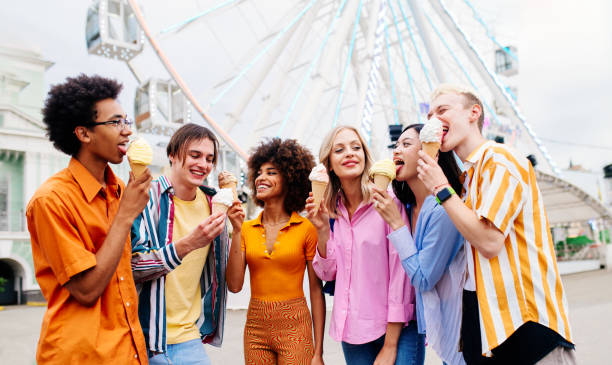 istock Group of multiethnics young friends having fun together 1457135334