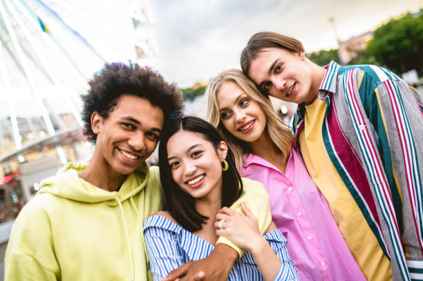 istock Group of multiethnics young friends having fun together 1457135406