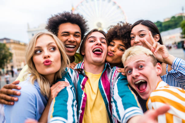 istock Group of multiethnics young friends having fun together 1457136206