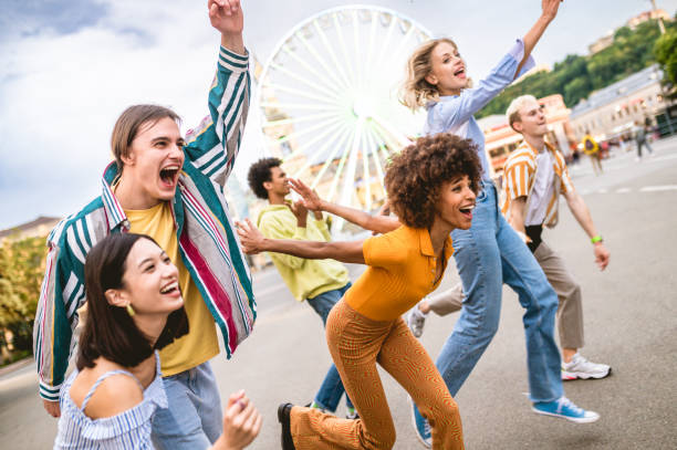 istock Group of multiethnics young friends having fun together 1457136474