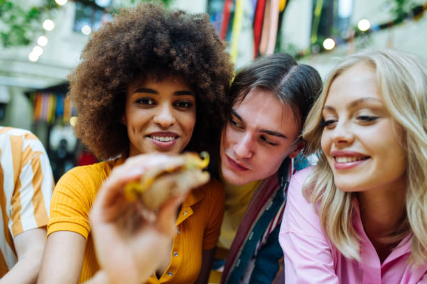istock Group of multiethnics young friends having fun together 1457137284